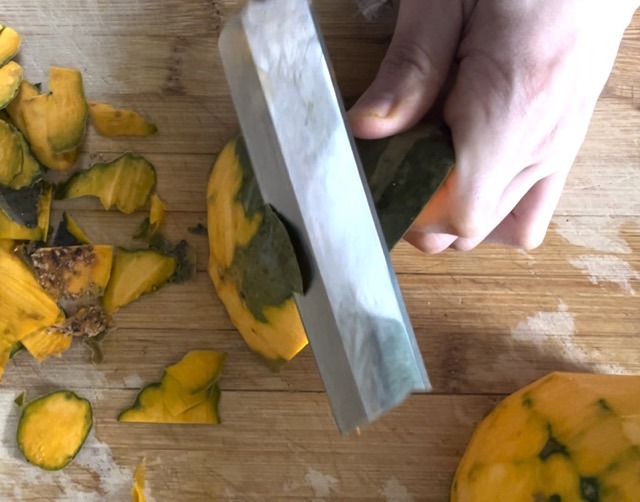 peeling kabocha squash with a knife