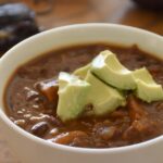 A bowl of vegan sweet potato chili.