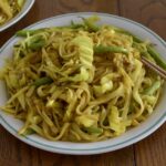 a plate of turmeric yaki udon