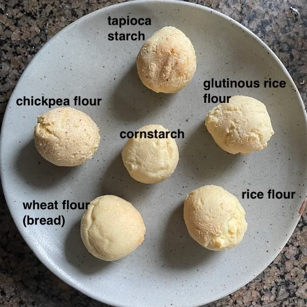 Tofu balls made with different binders on a plate.